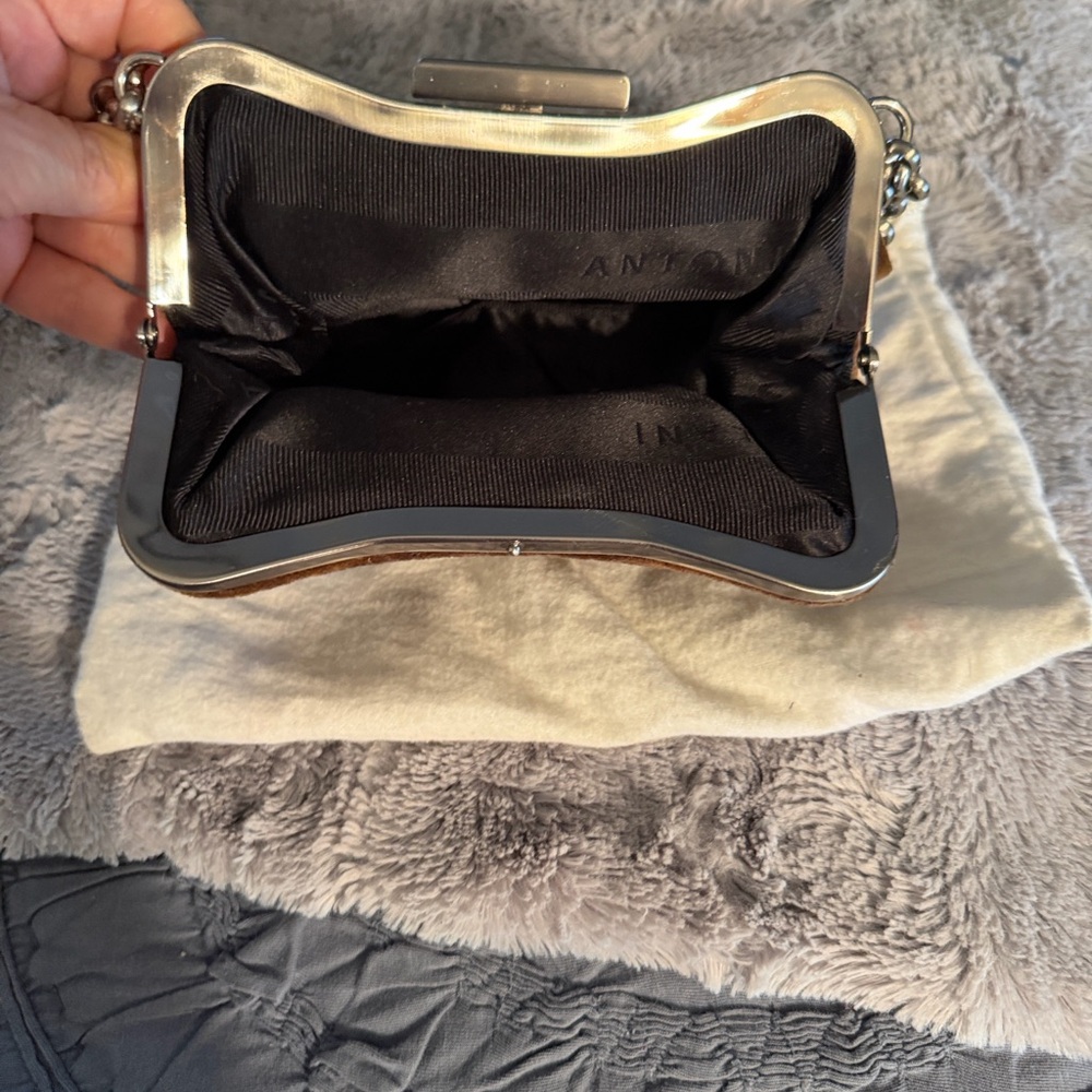 ANTONIO MELANI Silver and Black Clutch